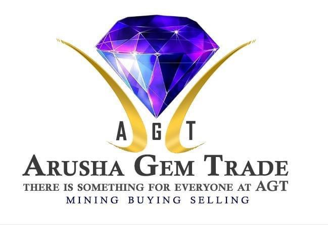 Arusha Gem Trade logo — a purple diamond with gold AGT branding